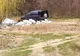 Slatina: Un bărbat care a depozitat deşeuri, într-o pădure de la ieşirea din oraş, identificat de Poliţia Locală după o postare pe Facebook