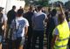 Soldaţii americani au vopsit parchetul sălii de sport a unui liceul din Caracal | FOTO