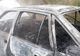 Imagini șocante. Autoturism distrus de un incendiu, pe un drum județean din Olt