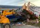 Un tren de călători a lovit un camion care transporta 70 de stupi de albine